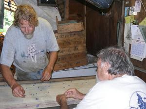 Gil and Nate doing blueberries