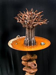 Birdbath with tree